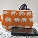 Clutch Wristlet Zipper Gadget Pouch White Elephants on Parade in Orange
