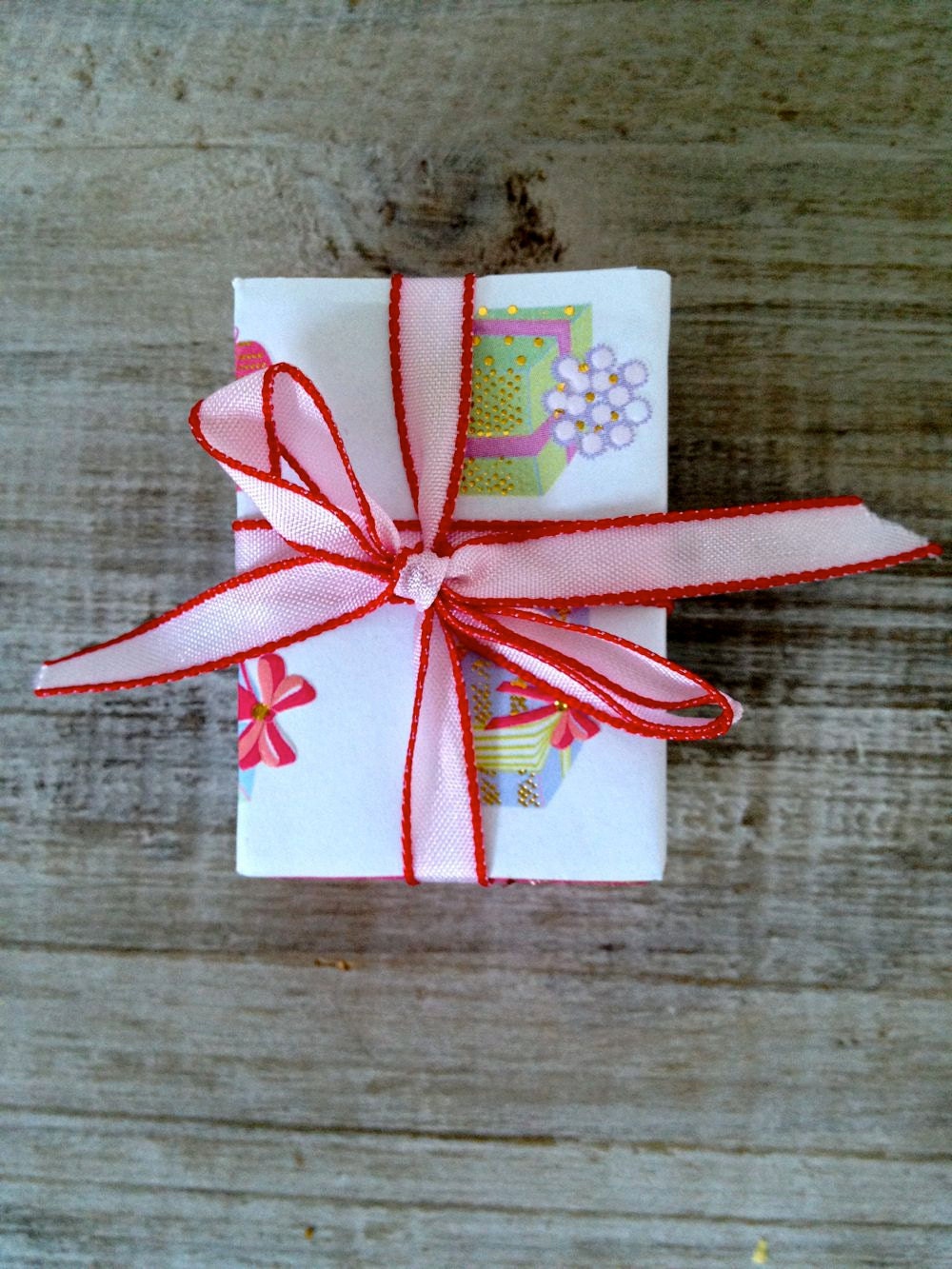 Altered vintage matchbox with a birthday party inside