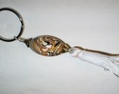 Keyring with polymer clay focal bead Retro in Motion in metallic clays