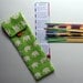 Stripey Pick Up Sticks in a Lime Green Elephant Print Pouch