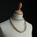 long necklace, choker or bracelet
