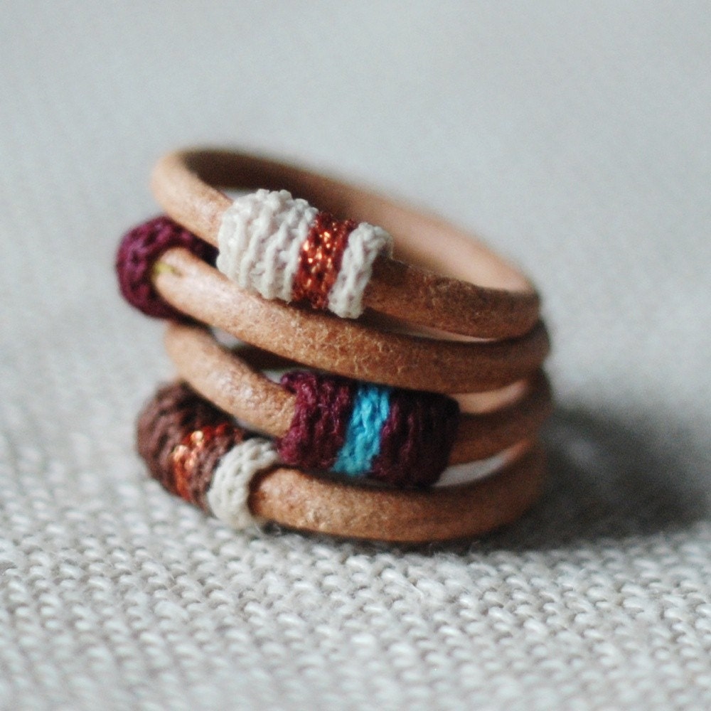 Set of four leather and cotton rings