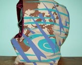 Tan Hood w arrow, skull xray, and wood grain print