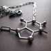 caffeine molecule necklace - oxidized silver