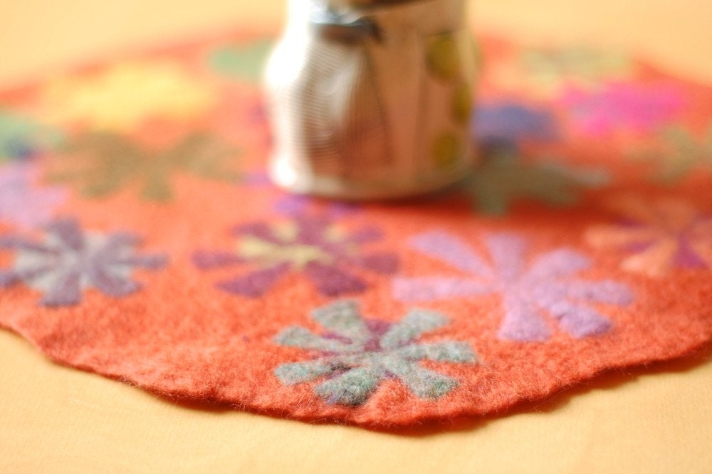 orange pin wheel round table runner