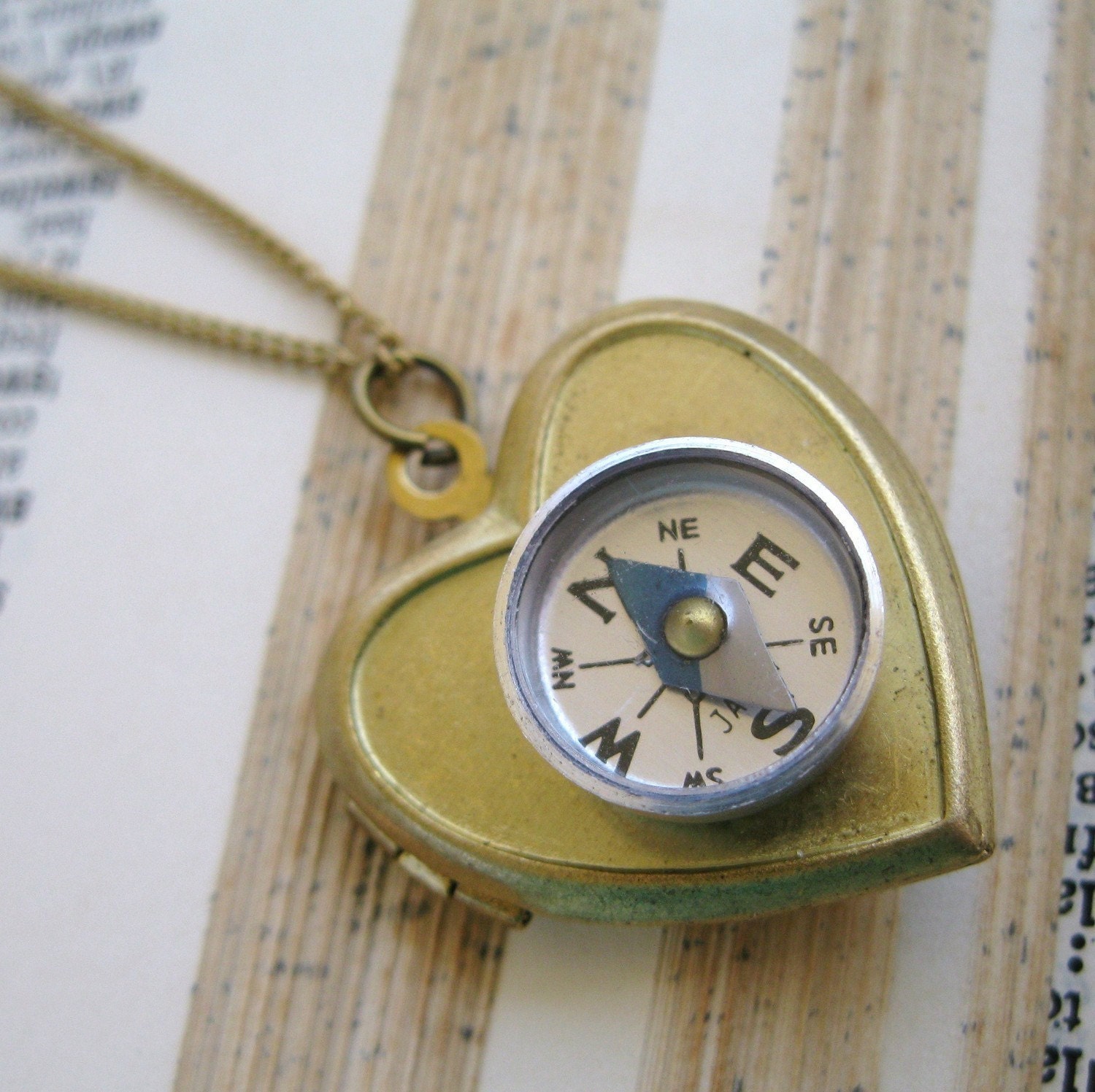Follow Your Heart locket and compass pendant on gold plated chain