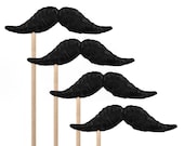 mustache on a stick. set of four / the banker