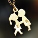FIRST KISS boy and girl kissing necklace with two hand stamped monograms / initials - 14k gold filled
