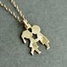 FIRST KISS boy and girl kissing necklace with two hand stamped monograms / initials - 14k gold filled