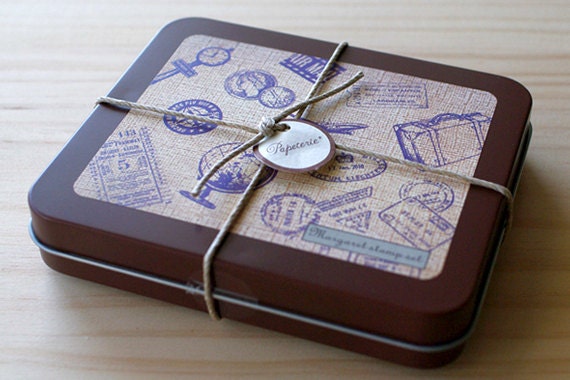 Wooden stamps in a can - Travel