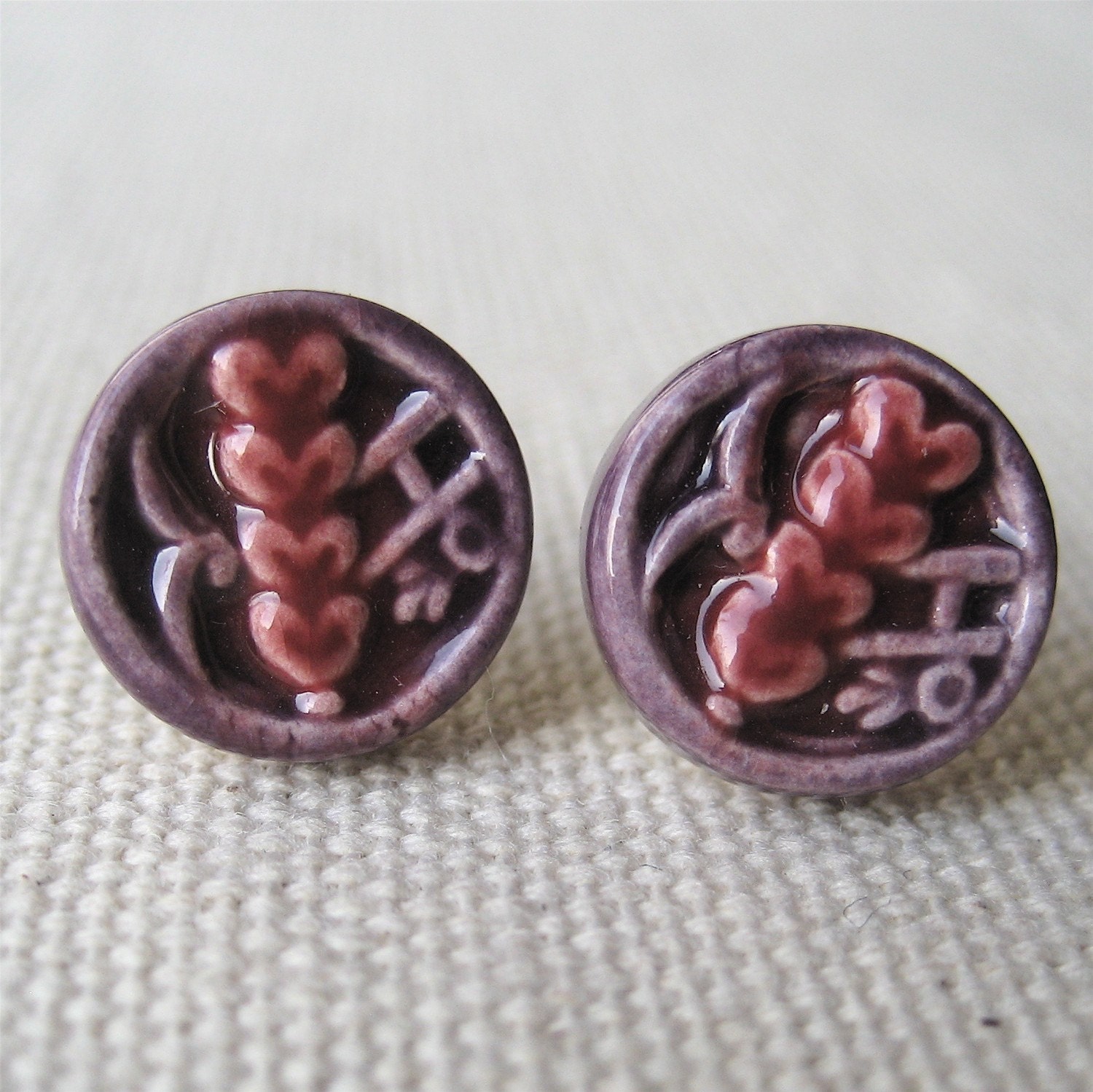 heart posts, plum ... porcelain earrings by Sofia Masri