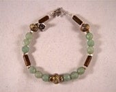 Bracelet - Faceted Green Chinese Jade, Handmade Bali Sterling Silver with Bali Sterling Silver Rose Charm, and Tubular Wood Beads