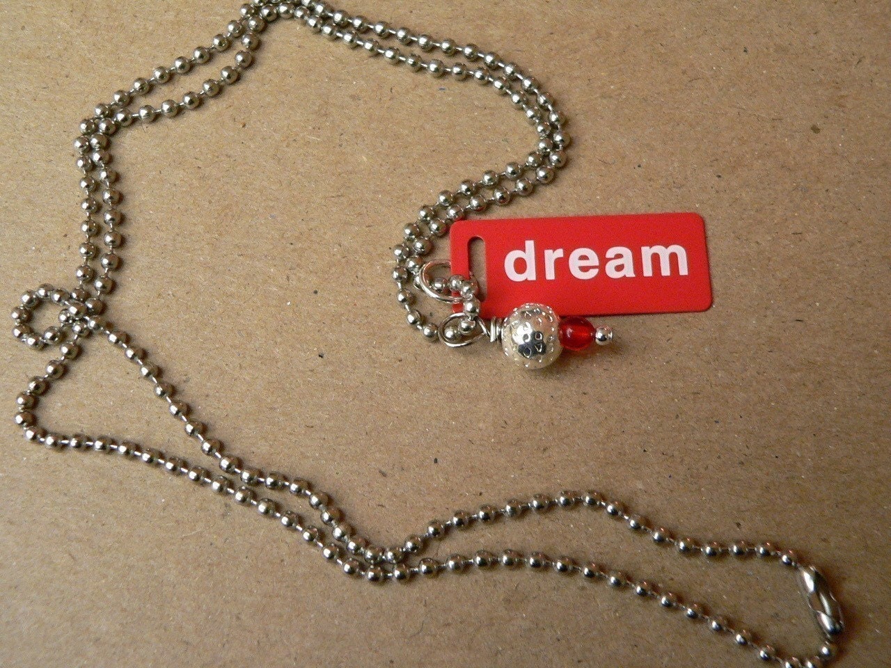 Red Dream Metal Tag Necklace On Silver Steel Chain