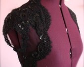 The Noir Shrug