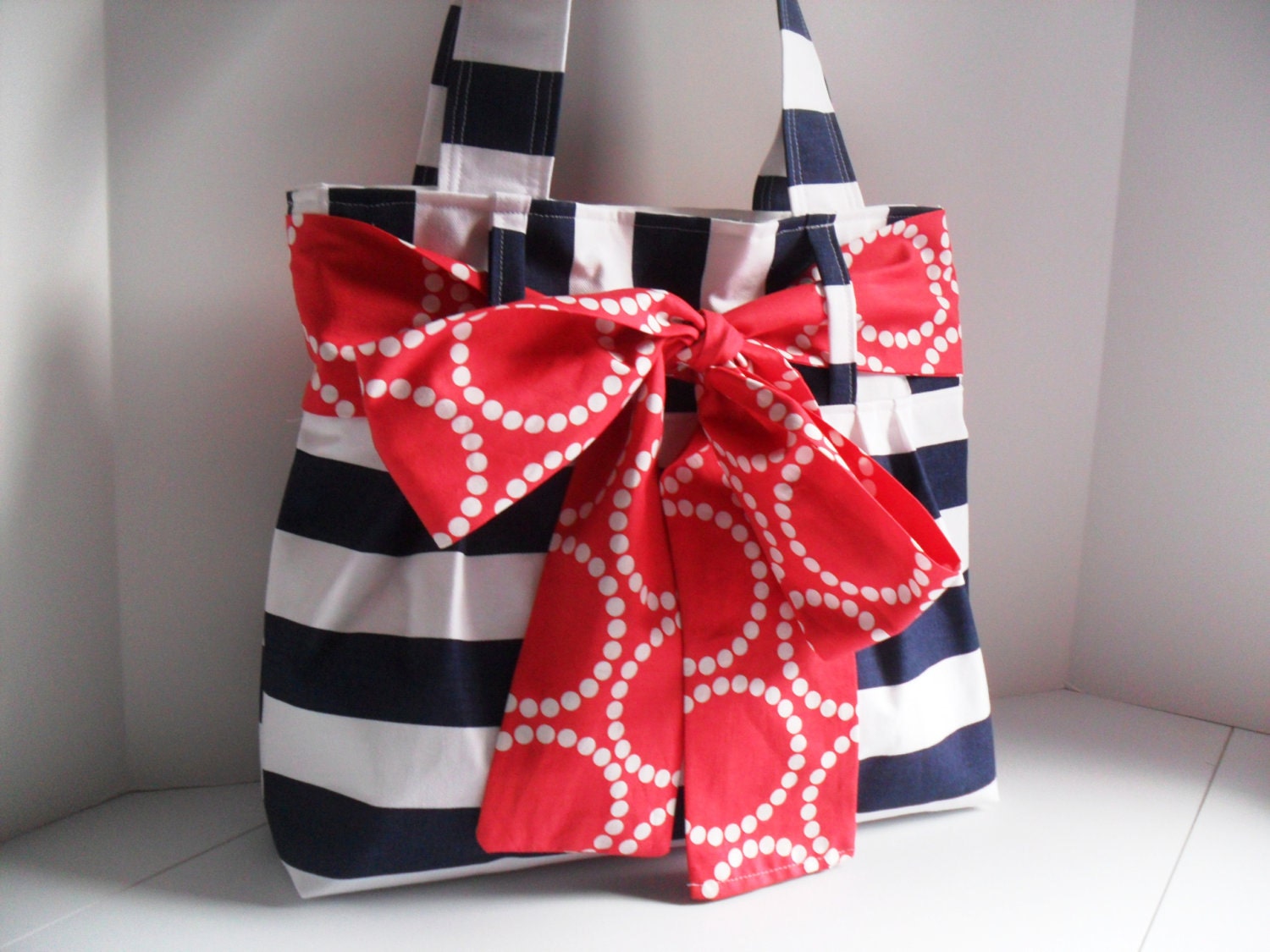 Medium Handbag Made of Navy Blue and White Stripe  Fabric with Red Bow