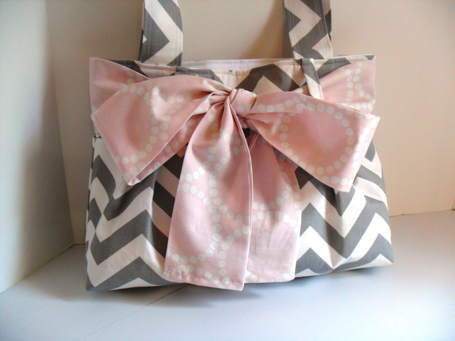 Small Handbag Made of Chevron  Fabric and Light Pink Bow