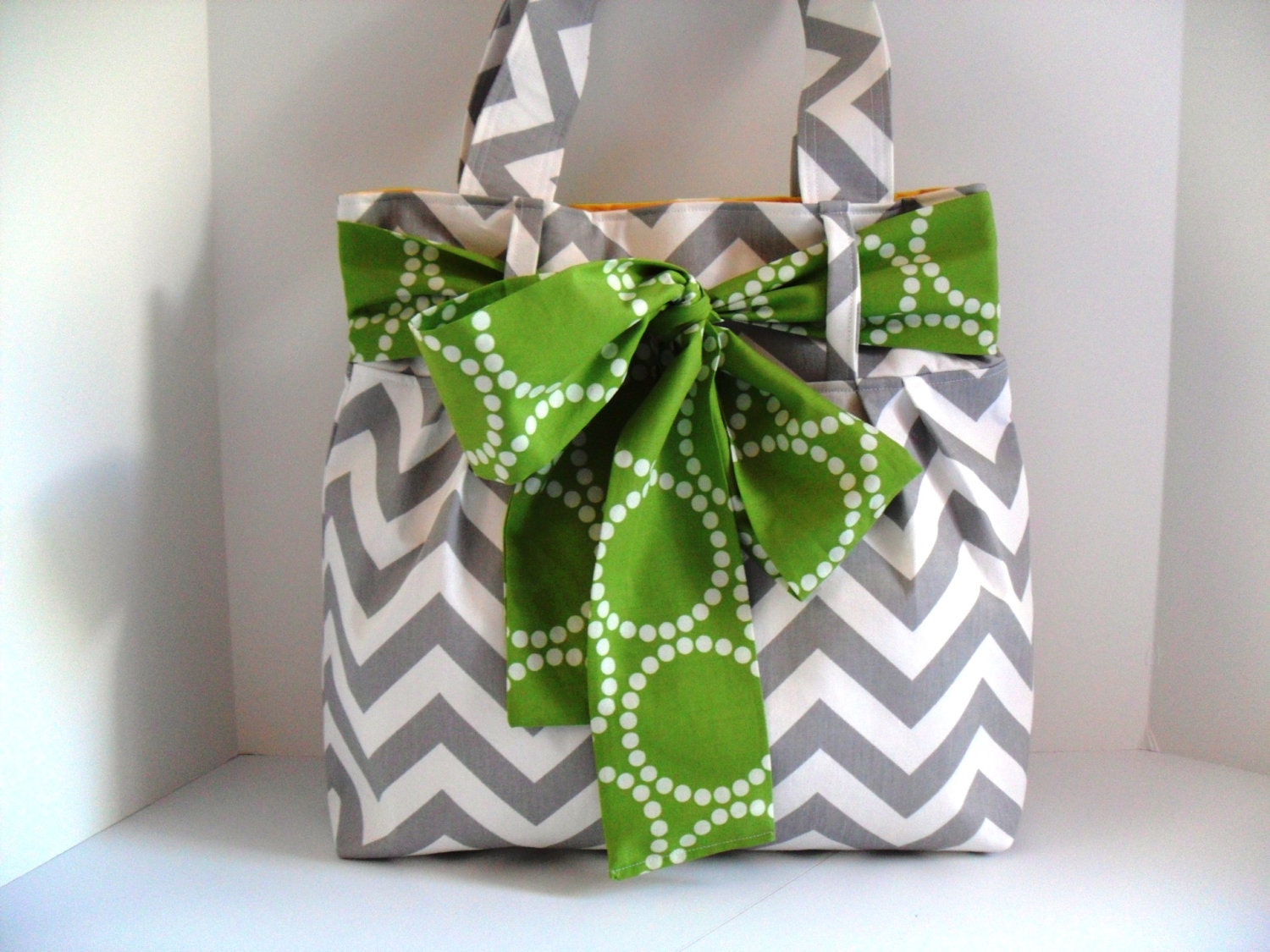 Handbag Made of Chevron  Fabric and Large Green Bow