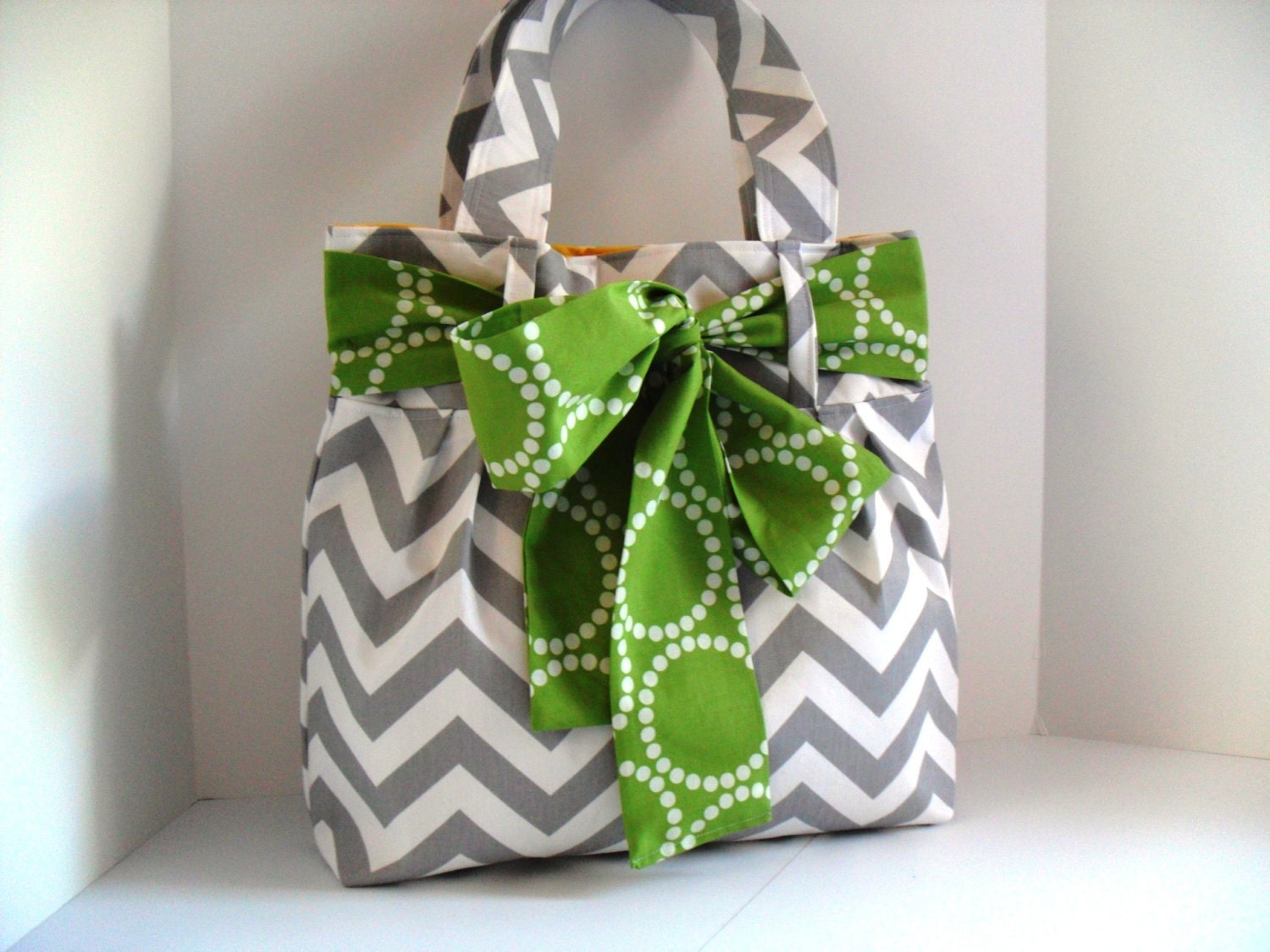 Handbag Made of Chevron  Fabric and Large Green Bow