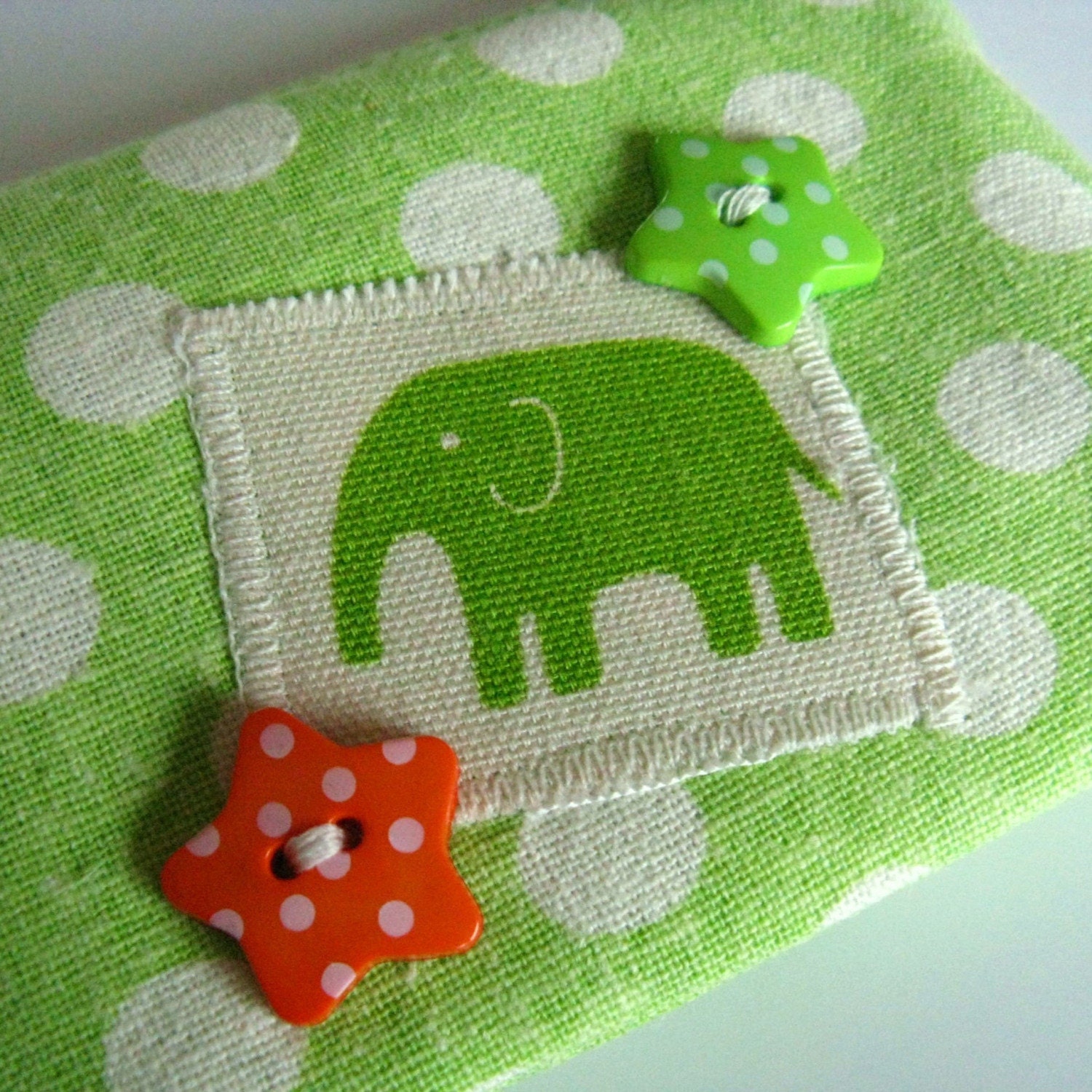 Slimline pencil case in lime green polka dot fabric with elephant motif