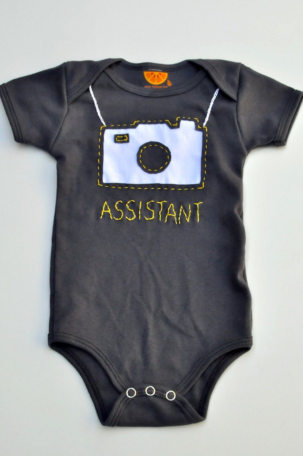 Camera handstitched onesie