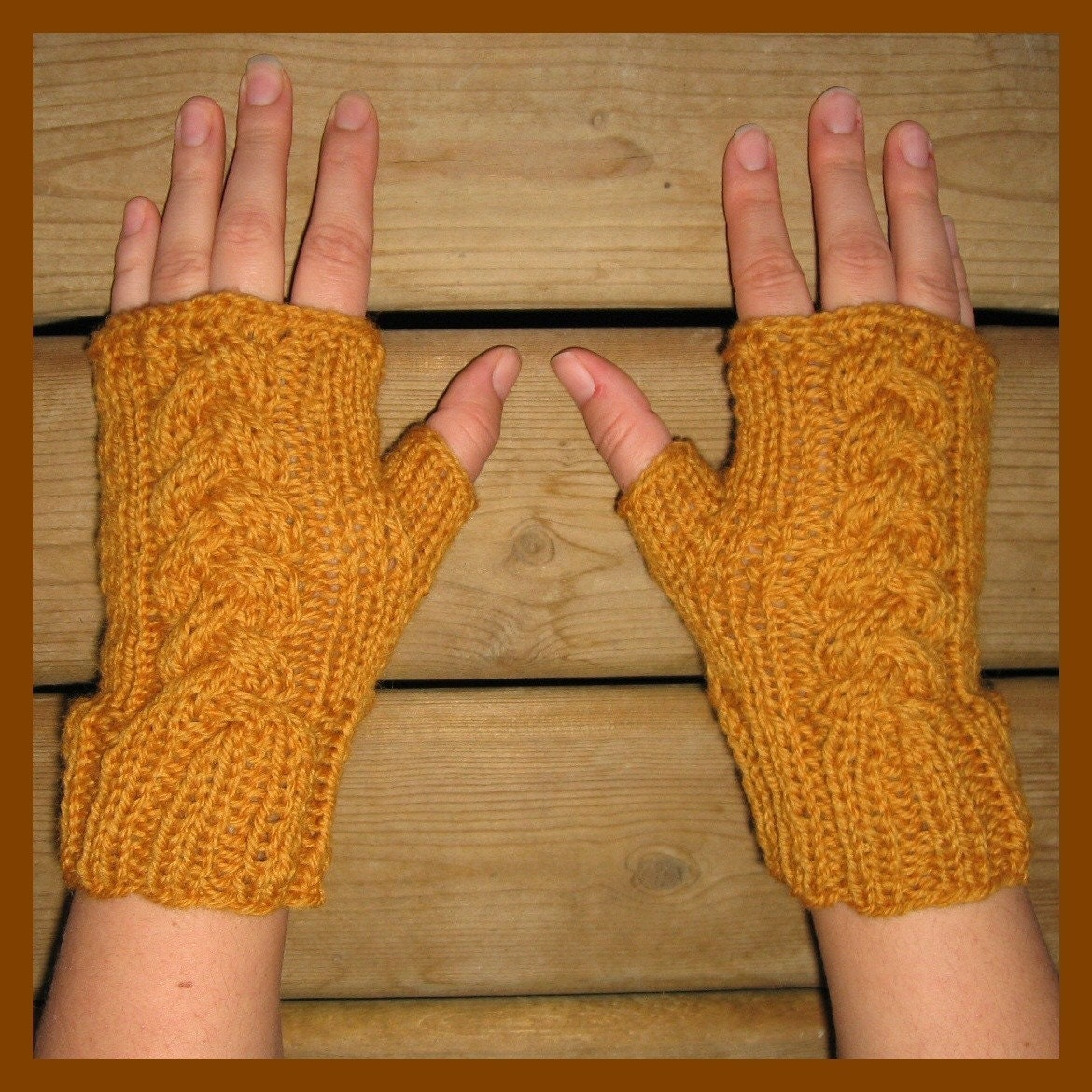 Hand knit fingerless mitts Old Gold color with cable pattern 100 percent wool