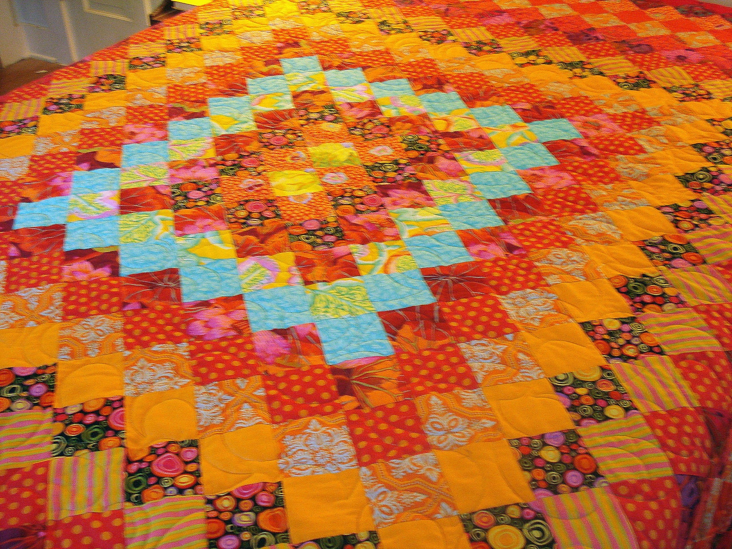 Full/Queen Quilt in Kaffe Fassett  Oranges and Reds Trip Around The World Design