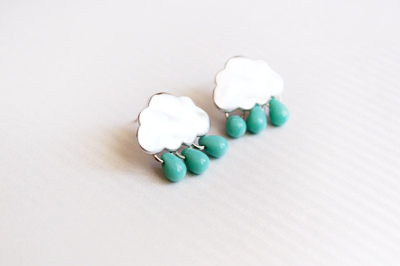 Two matte silver tone clouds with sterling silver back posts with rubber backings. 3 little turquoise drops are attached to the cloud and dangle in an adorable way! They measure 17x10 mm and each drop is 6mm. Lightweight and easy to wear!