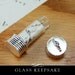Glass Keepsake Pendant with Precious Metal Plating. The Secret Keeper with Removable cap.