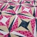 ON SALE -- Raspberry Swirl Quilt