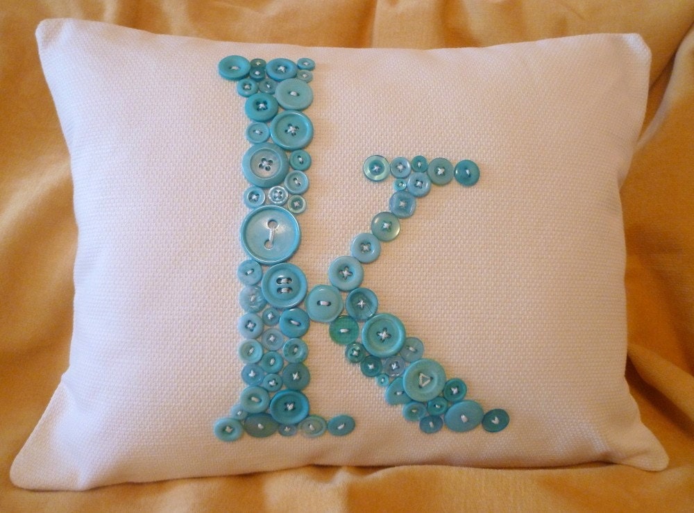 White Letter 'K' Pillow Monogrammed in Ocean Blue Buttons -- by Letter Perfect Designs on Etsy -- Any Letter Available