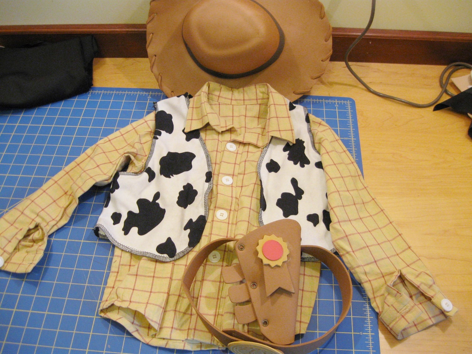 handmade Woody Toy Story costume with Disney Pixar hat and holster used