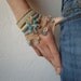 Fuchsia Pilaloensis ... Freeform Crochet Cuff - Flowers - Cream Beige Teal Blue