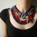 Corydalis Flexuosa ... Freeform Beaded Crochet Necklace - Flowers - Red Burgundy Blue Persimmon