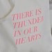 thunder in our hearts tote in fluro pink