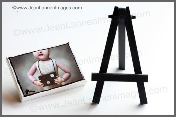 OOAK - Her First Camera, MM Orig Altered Photo on Mini-Canvas w/Easel-Old Creepy Doll w/toy camera, little fingers cute face By Jean Lannen