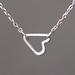 Tiny Sideways Heart Necklace in Sterling Silver