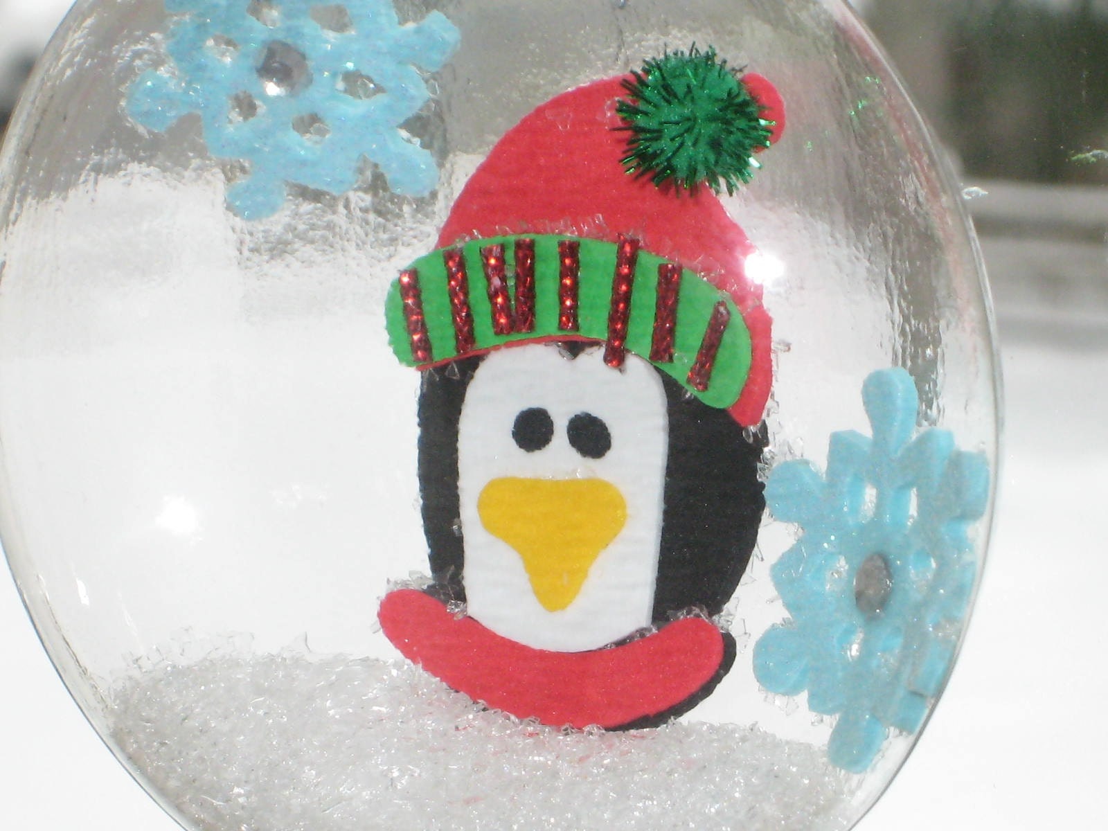 Squashed Snow Globe Glass Tree Ornament - Penguin and Snowflakes