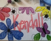 Hand personalized bright butterflies and flowers name sign