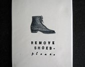 REMOVE SHOES plaque (boot).