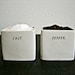 square SALT and PEPPER cellars.