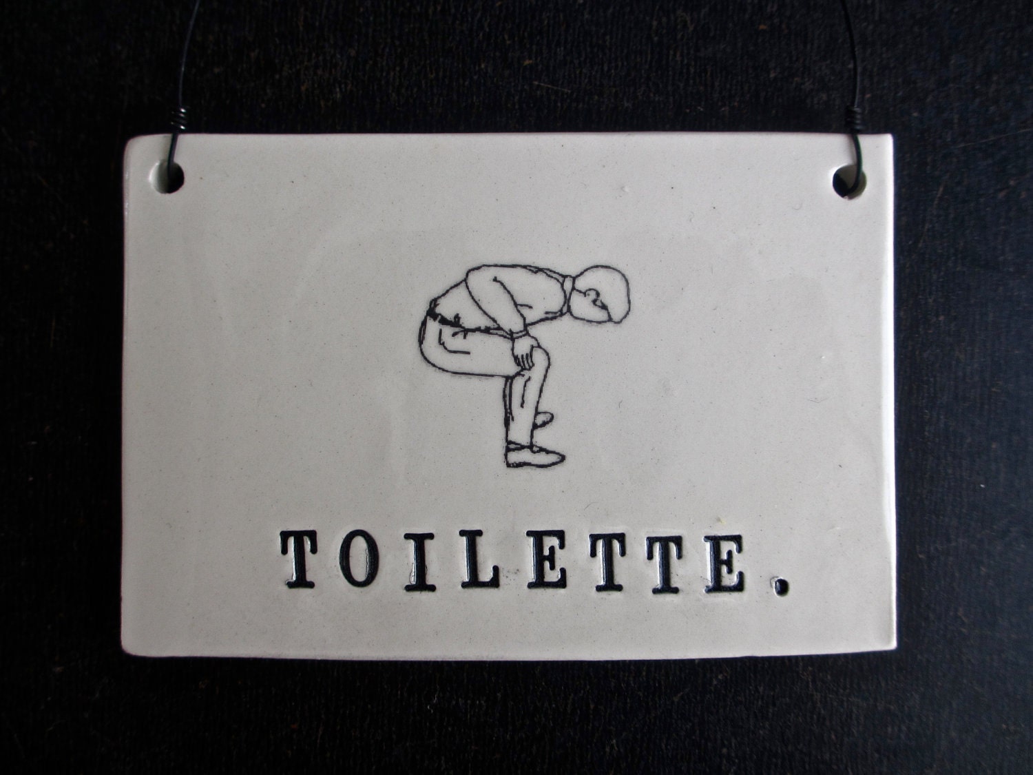 TOILETTE plaque with man.