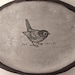 oval bird dish.