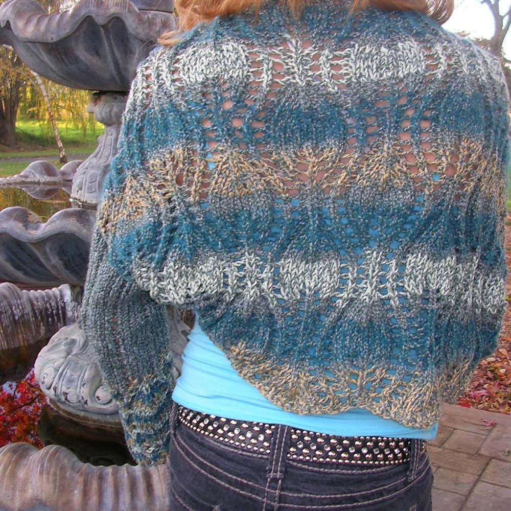 Sand, sea and sky shrug