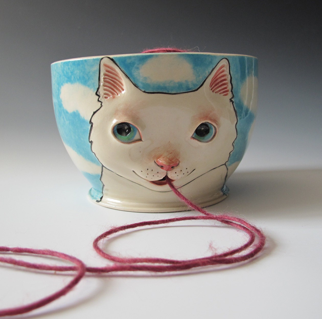 White Cat Yarn Bowl - sculpted kitty against blue sky