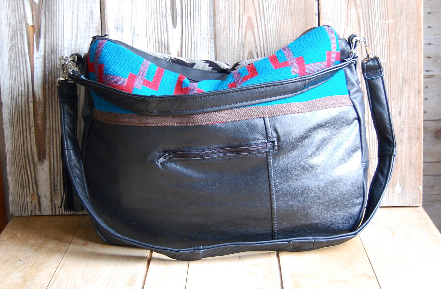 Tundra in reclaimed black leather and navajo fabric