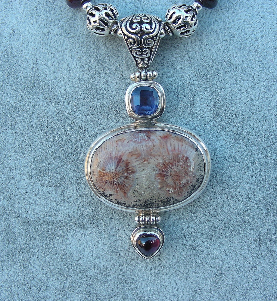 Lolite garnet fossil necklace beautiful pendant all sterling silver comes in a tarnish r pouch