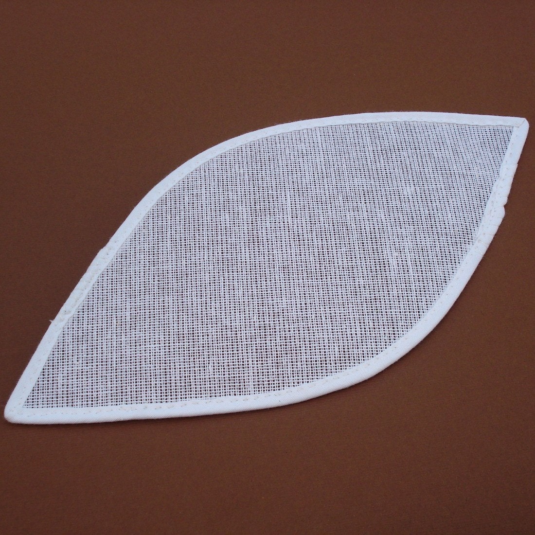 Charlie, a pointed oval hat form
