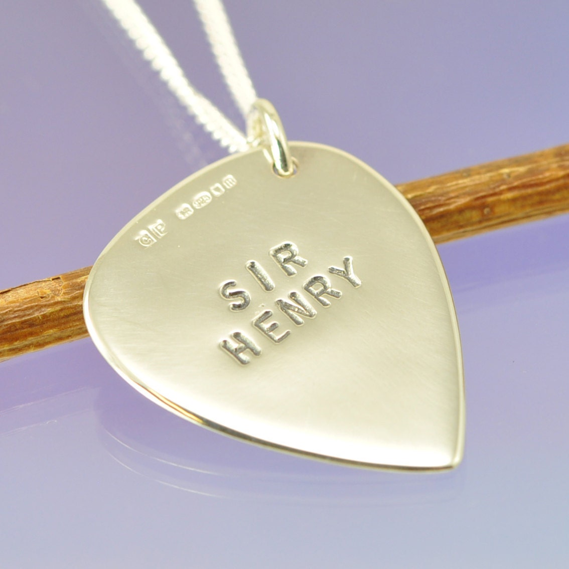 Sterling Silver Guitar Pick (plectrum). Personalised with your quote.