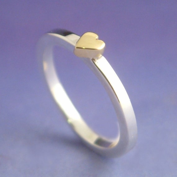18k yellow gold heart atop a sterling silver ring. Valentine