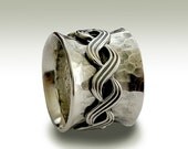 Sterling silver oxidized band with eternity celtic braided spinner - Nothing compares